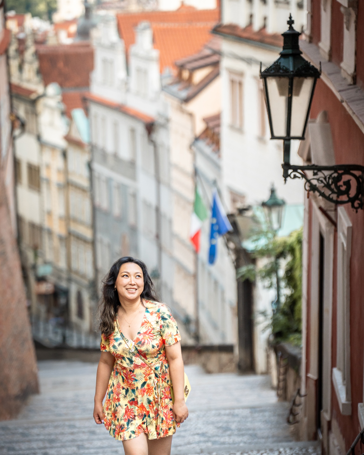 Solo traveler in a sunlit Prague street